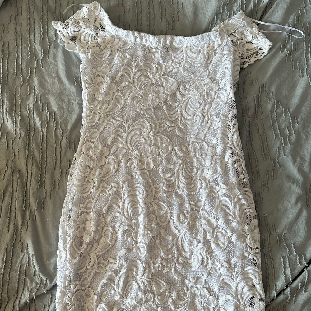 white skin tight dress